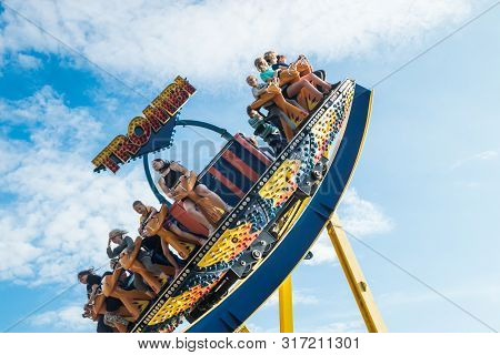 Kouvola, Finland - 10 August 2019: Ride Trombi In Motion On Sky Background In Amusement Park Tykkima