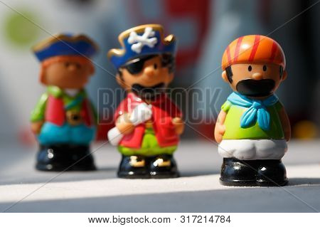 Colored Toys Pirates On Blurred Background Large Plenum