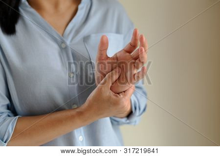 Woman Wrist Arm Pain Long Working. Office Syndrome Healthcare And Medicine Concept