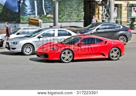 Kiev, Ukraine; October 22, 2014, Ferrari F430 In Motion. Red Supercar