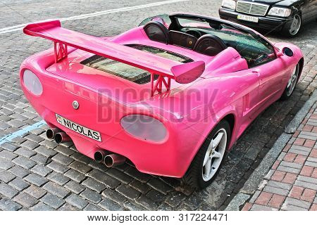 Kiev, Ukraine; April 18, 2015. Ferrari Modena F360 Spider Sbarro Gt8. City. Tuning. Supercar