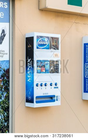 Orange, France - June 4, 2019: Condom Machine With Manix And Skyn Condoms.