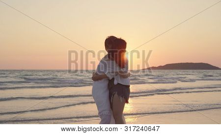 Young Asian Lesbian Couple Running On Beach. Beautiful Women Friends Happy Relax Having Fun On Beach