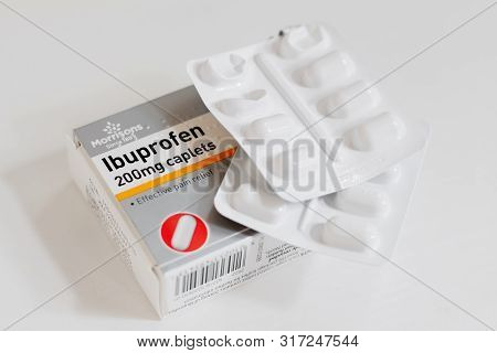 London / Uk - July 8th 2019 - Packet Of Ibuprofen Painkillers, Closeup With Blister Packs Of Tablets