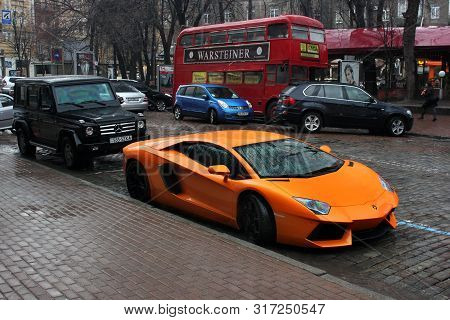 Kiev, Ukraine; July 4, 2013; Lamborghini Aventador And Mercedes-benz G55 Amg On The Streets
