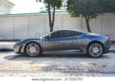 Kiev, Ukraine - June 9, 2013; Ferrari F430 In Gray In The City