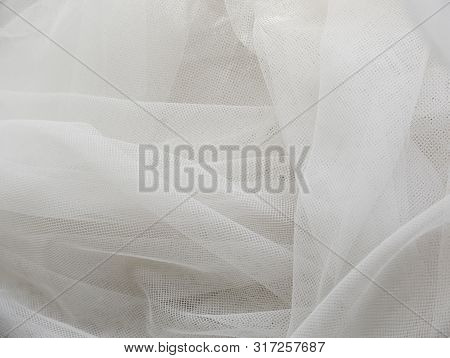 Wedding White Silk Transparent Fabric. Abstract Soft Chiffon Texture Background. Soft White Chiffon 