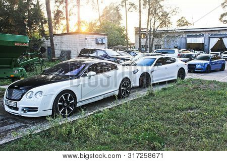 September 30, 2014, Kiev, Ukraine. Combo Supercars. Mansory Bentley Continental Gt & Porsche Panamer