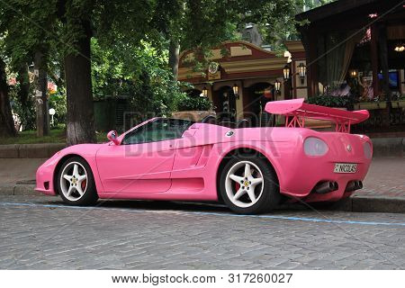 Kiev, Ukraine; May 17, 2016. Pink Ferrari Modena F360 Spider Sbarro Gt8