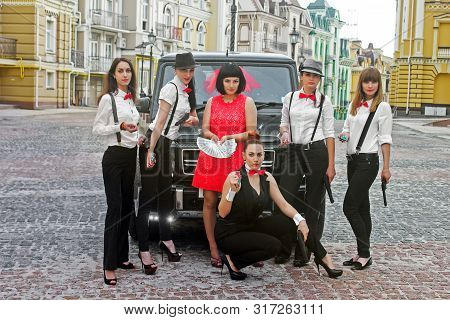 Ukraine, Kiev. June 25, 2013, Mercedes-benz G55 Amg And Girls With Arms On The Background Of Old Hou