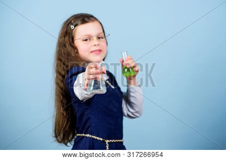 Small Girl Scientist With Testing Flask. Back To School. Science Research In Lab. Small Genius Girl.
