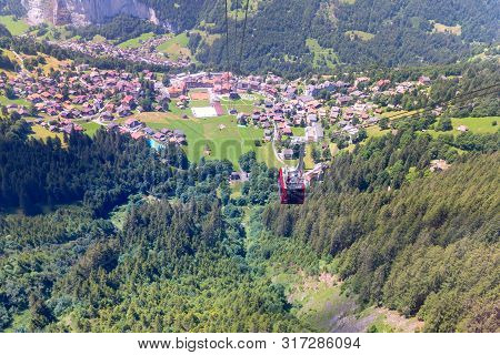 Scenic Aerial View Of The Swiss Alps On A Sunny Day. Mannlichen