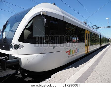 Diessenhofen, Switzerland On August 2018: White Modern Train On Platform At Railway Station In Europ
