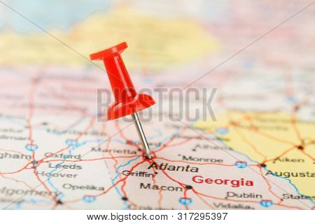Red Clerical Needle On A Map Of Usa, South Georgia U.s. State And The Capital Atlanta. Close Up Map 