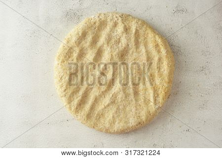Raw Circle Dough. Pastry Or Bread Dough. Bright Background. Flat Lay. Cooking Process.