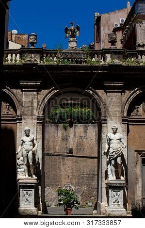 Rome, Italy - April, 2018: Details Of The Statues In The Courtyard Of The Palazzo Mattei Di Giove