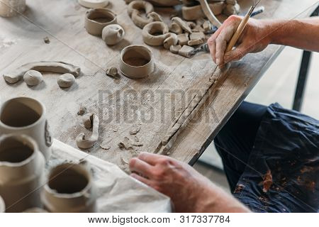 Male Potter Hands Working With Clay. Art Work Concept.
