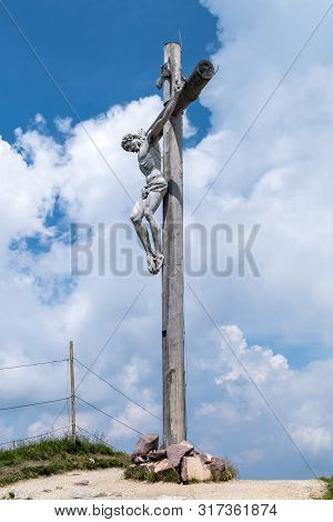 Seceda, Italy - July 25, 2019 - This Is The Wooden Crucifix On Top Of Seceda Mountain In The Italian