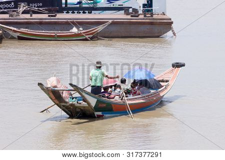 Yangon, Myanmar-may 8th 2014: Passengers Aboard A Ferry. Ferries Are Regularly Used To Cross The Riv