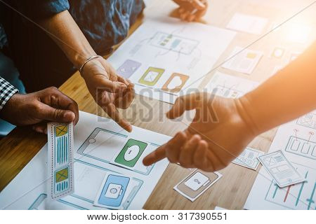 User Experience Ux Designer Designing Web On Smart Phone Layout. Ui Planning Mobile Application. Dev