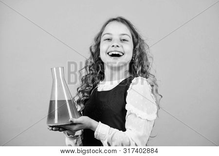 Small Girl Scientist With Testing Flask. Education And Knowledge. Child Study Bilogy Lesson. Discove
