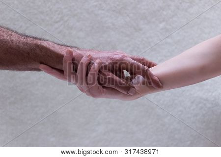 Boy And Girl  Hands Of Different Skin Color Approaching. Tenderly, Honey



Boy And Girl Hands Of Di