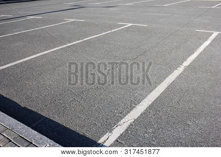 Free Parking Spaces. Empty Parking Lot. Paid And Free Parking.