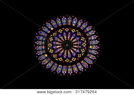 Como, Italy - March 10, 2019: Stained Sun Shaped Glass Windows In Cathedral Of Como, Italy