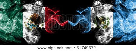 Mexico Vs Guatemala, Guatemalan Smoky Mystic Flags Placed Side By Side. Thick Colored Silky Abstract