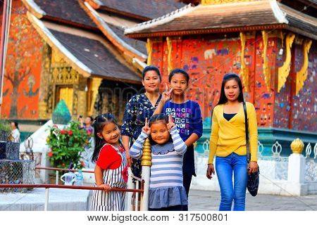 Luang Prabang, Laos - February 17, 2018: Groups Of Local Visitors Are Visiting Famous Wat Xiengthong