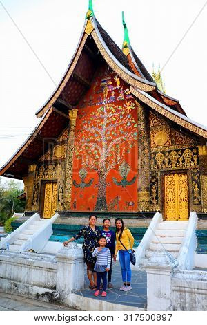 Luang Prabang, Laos - February 17, 2018: Groups Of Local Visitors Are Visiting Famous Wat Xiengthong
