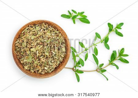 Dried Thyme Leaves In The Wooden Bowl, With Fresh Thyme Isolated On White Background. Top View