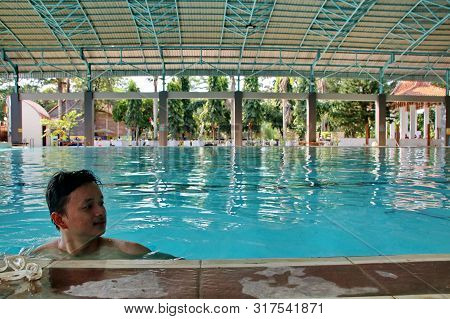 A Group Of People Doing Diving Training In A Swimming Pool In Batang / Central Java, Indonesia, Augu