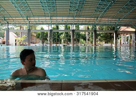 A Group Of People Doing Diving Training In A Swimming Pool In Batang / Central Java, Indonesia, Augu