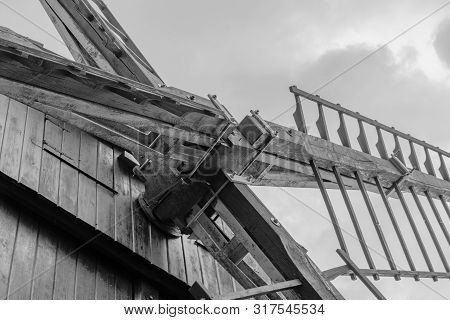 Detailed Close Up Of Sail Arm Of An Old Wooden Post Windmill In Prietzen, Germany In Monochrome