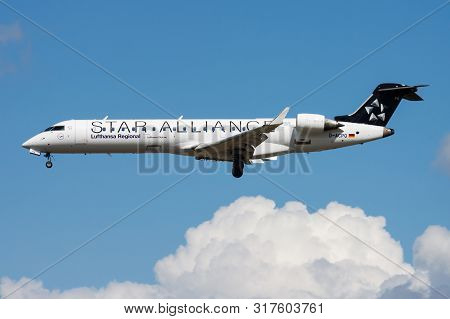 Frankfurt / Germany - August 12, 2014: Star Alliance Lufthansa Regional Bombardier Crj-700 D-acpq Pa