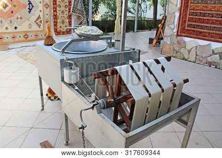 Spinning Wheel And Other Equipment For Separating Fine Silk Threads From Cocoons In A Kibbutz In Tur