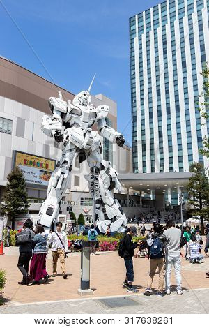 Tokyo, Japan - April 28, 2019, The Unidentified Traveler Look At Rx-0 Unicorn Gundam Statue In Norma