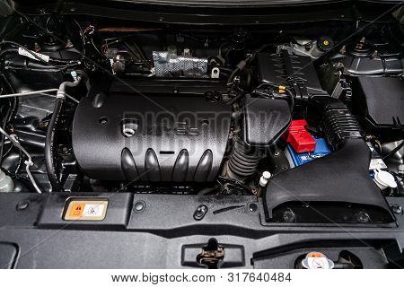 Novosibirsk, Russia - July 31, 2019:  Mitsubishi Outlander, Close-up Of The Engine, Front View. Inte