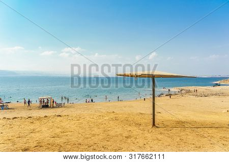 Dead Sea, Jordan - October 13, 2018: People Floating On Water In The Dead Sea Jordan .the Dead Sea I