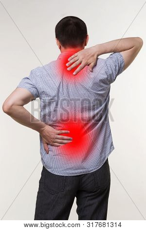Pain In The Male Body, Man With Backache, Sciatica And Scoliosis, Chiropractor Treatment Concept