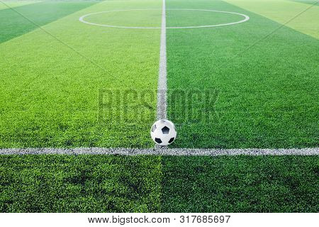 Soccer Ball On Artificial Turf For Green Background.