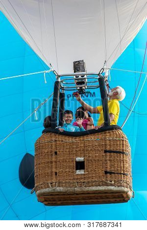 Songkhla, Thailand - May 10,2019 :the Children Had The Opportunity To Stay On The Balloon. And Risin