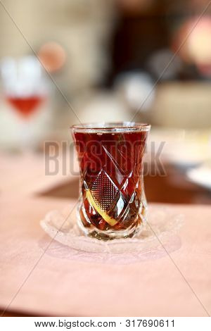 Armud Glass With Black Tea In Cafe