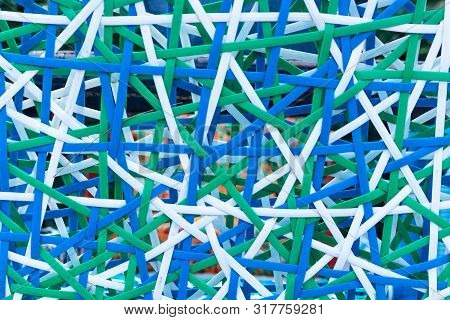 Background Of Variety Colors Of Rattan Lines That Are Alternately Woven Into Mesh Style