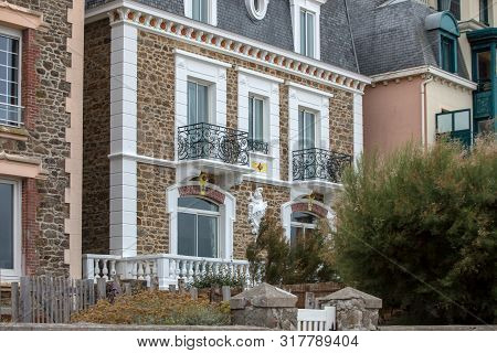 Front View Of Traditional Granite Houses Along The Promenade In Saint-malo