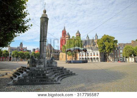Vrijthof, With  The Basilica Of Saint Servatius And Sint Janskerk Church In The Background And A Mon