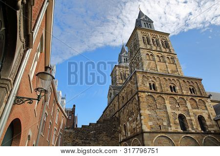 The Clock Towers Of Basilica Of Saint Servatius, Located At Vrijthof, Maastricht, Netherlands