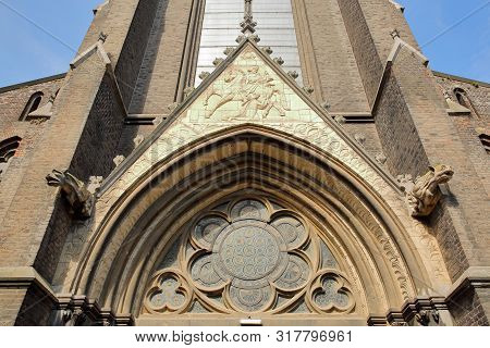 Close-up On The Entrance Of Sint Martinuskerk Church, Located In Wyck Neighborhood, With Gargoyles A