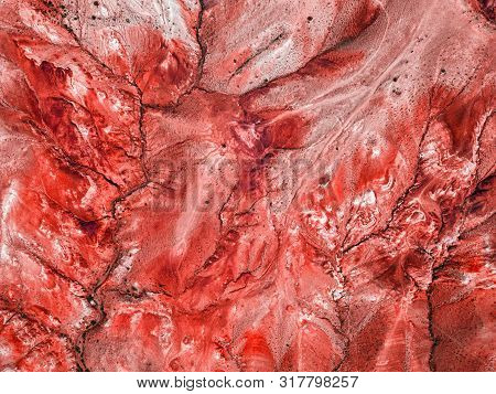 A Stunning Panorama Of A Mountain Chain Of Peaks, A Canyon With Red Clay, Top View. Mars Fields In A